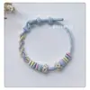 Pulsera de Cuerda Trenzada Flor de Durazno, Pulsera de Margarita Hecha a Mano, Colgante de Perro Canela de Jade Chapado en Oro y Conejo de Luna, Tejido Original Hecho a Mano de Xiaohongshu