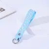 Lanyard para Taza de Agua Portátil Anti-Pérdida al Aire Libre Venta al por Mayor Muñeco de Dibujos Animados Creativo Llavero con Letra Colgante Lindo para Mochila
