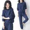 Traje casual de punto gofre estilo simple para mujer primavera otoño moda sudadera de manga larga cuello redondo bolsillo puño elástico pantalones de chándal dos piezas