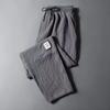 Calças masculinas de verão de seda de gelo de linho fino e fresco com elástico largo esportivo para meninos da moda marca para todos os jogos em linha reta calças casuais