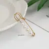 Pin de cintura para pantalones artefacto de cintura para fijar ropa cárdigan de punto para mujer botón anti-luz al por mayor broche de perla
