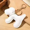 15 Colores Venta Directa de Fábrica Transfronterizo Dibujo Animado Perrito Colgante para Bolso Creativo Cuero Perrito Llavero para Coche Colgante