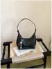 Bolsa de Axila de Nicho Estilo Francês Transfronteiriça para Mulheres, Nova Bolsa de Valor Elevado em Formato de Meia-Lua, Bolsa de Ombro e Transversal Versátil e Fashion, Tendência