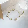 Set de trébol de cuatro hojas de acero de titanio de doble cara transfronterizo de Amazon: pulsera, collar, pendientes, anillo, juego de cuatro piezas, joyería que no se decolora