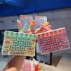 Novo produto criativo e fofo: Chaveiro de brinquedo de botão antiestresse com 26 teclas, acessório de pingente para bolsa infantil, diversão sem parar