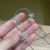 Aretes de copo de nieve de diamantes completos súper de hadas otoño e invierno Nuevos aretes sin oreja Mori sentido de alta gama nicho aretes dulces frescos