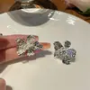 Nuevos pendientes de botón de flor líquida 2023 para mujer, aguja de plata 925, diseño de nicho, clip para la oreja de moda, pendientes de moda versátiles