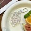 2026 Otoño Estilo Dibujos Animados Acrílico Oso Muñeco Llavero Colgante Boda Regalo Decoración Juguete Pequeño