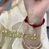 El año de esta vida es impactante y seguro. Pulsera de cuerda retro roja azul melocotón. Cuerda de mano ajustable tejida a mano para regalo de novias