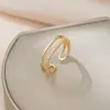 Anillo moda femenina personalidad acero de titanio no se decolora Joker lujo ligero doble capa anillo abierto alto sentido fabricantes venta al por mayor