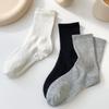 Calcetines de mujer hasta media pantorrilla, otoño e invierno, modernos calcetines deportivos blancos, de color liso, informales, a juego, para hombre, entrega de una pieza