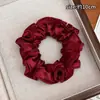 Elástico de Cabelo Vermelho Estiloso para Mulheres Laço Doce Alto Anel de Cabelo de Intestino Grosso Estilização da Parte de Trás da Cabeça Elástico de Cabelo Sem Costura Acessórios de Cabelo