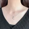 Collar de Estrella de Ocho Puntas con Circonita de Venta Caliente Transfronteriza Europea y Americana para Mujer Colgante de Luna Cadena para Clavícula Accesorios Luna Creciente Estación Independiente para Mujer