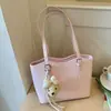 Bolso de hombro grande minimalista transfronterizo para mujer, nuevo bolso de moda 2026 para estudiante universitario, bolso tote de gran capacidad para verano