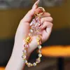Cadena para Teléfono Gato de la Suerte Versátil de Año Nuevo Colgante León de la Buena Fortuna Bolso Rojo Festivo con Perlas Accesorio para Cámara