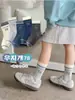 Nuevos calcetines deportivos versátiles antibacterianos de moda para otoño e invierno de Minliu, calcetines de media pantorrilla para niños y niñas, calcetines infantiles sin costuras anti-pilling