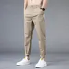 Pantalones casuales de seda helada para hombre, verano, finos, deportivos, para niños, traje pequeño, rectos, holgados, pantalones de nueve puntos para hombre