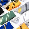 Calcetines deportivos de tendencia slash para hombre, nuevos, directos de fábrica, calcetines de baloncesto antideslizantes y absorbentes del sudor, calcetines de élite para el cabello para hombre.