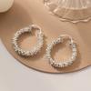 Pendientes de círculo irregular exagerado en forma de C, estilo europeo y americano, con un diseño moderno y elegante para mujer.