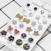 Transfronterizo Europa y Estados Unidos 12 pares de aretes de clip combinados de flores y diamantes juego de aretes personalidad una variedad de aretes de aleación