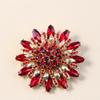 Broche de girasol con diamantes de imitación de moda retro europea y americana, elegante broche de cadena de suéter de alta gama, elegante y de lujo, combina con todo.