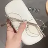 Nuevo marco de gafas metálico poligonal retro artístico pequeño, marco de gafas liso de moda Danyang al por mayor, se puede equiparar con lentes graduados