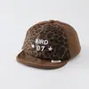 Boné de beisebol infantil estilo coreano com estampa de leopardo e blocos de cor BIRD07 Boné de beisebol Star Baby, proteção solar versátil para meninos e meninas