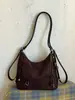 Mochila de Felpa de Gamuza Súper Caliente para Mujer 2026 Nueva de Gran Capacidad Bolso de Hombro Retro Mate Versátil para Viajar Bolso Cruzado