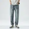 Novedades Primavera/Verano 2026 Parche Pequeño de Cuero en la Parte Delantera Jeans Cónicos Azul Claro