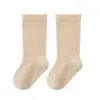 Calcetines para bebé, nuevo modelo de invierno, color liso, forrados de felpa, engrosados, calcetines cálidos, puño ancho, sin costuras, para niñas, niños y bebés, calcetines de media pantorrilla