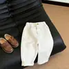 Conjunto de polo de verano para niños estilo dopamina a rayas de manga corta 2026 nuevos pantalones casuales versátiles y elegantes para niños