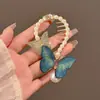 Grampo de cabelo com borla de asas de anjo super imortal feminino, grampo de sentido de alto nível, parte de trás da cabeça, grampo de cabeça de bola, artefato de cabelo, acessórios de cabeça