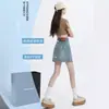 Saia Jeans Curta Bordada Feminina Verão Fina 2024 Nova Cintura Alta Cobertura de Barriga Modelo A Antiluz Saia Pequena para Quadril
