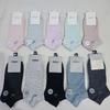Meias casuais de algodão de cintura baixa, curtas e lisas, para primavera, verão e outono, masculinas e femininas, para corrida, promoção de volume, atacado, cor, negócios