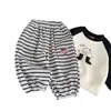 Pantalones de chándal a rayas para niño 2026 Primavera Nuevo estilo Pantalones jogger para niño Versátiles Pantalones largos Bebé Casual Modernos Geniales Estilo Delgado