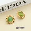 Moda europea y americana nicho pendientes vintage acero de titanio chapado en oro de 18 quilates temperamento geométrico piedra natural ojo de gato solar pendientes mujer