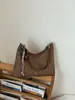 Bolsa de brim de grande capacidade para mulheres, nova bolsa versátil de ombro e transversal para o verão de 2026, bolsa tote para ombro de trajeto transfronteiriço