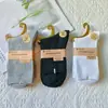 Calcetines nuevos de doble aguja para dama color sólido casual de algodón calcetines de otoño e invierno gruesos cálidos algodón peinado calcetines de mujer al por mayor