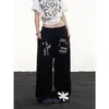 Pantalones de chándal estampados patchwork retro americano 2026 para hombre y mujer, corte ajustado hip-hop deportivo casual para pareja, pantalones de pierna ancha de moda