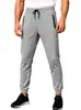 Pantalones deportivos para hombre con cordón para comercio exterior transfronterizo, talla europea de Amazon, modelo nuevo con bolsillos con cremallera, ajustados con puños, pantalones casuales deportivos