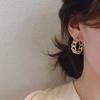 Nuevos pendientes de moda con diseño de anillo retro, huecos y de metal, estilo Hong Kong, elegantes, sencillos y de alta gama.