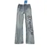 Jeans curvos estampados con patrón de rayo lavado retro americano para hombre, pantalones adelgazantes con vibra de alta costura, jeans de pierna recta acampanados