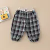 Pantalones para Niños y Niñas Primavera y Otoño 2025 Nuevos Elegantes Pantalones Deportivos de Cuadros Pantalones Largos Casuales para Niños Venta al por Mayor