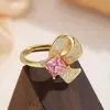 Anillo de Lujo Ligero Transfronterizo con Moño de Circonita Rosa para Mujer, Anillo Abierto Ajustable, Anillo Dulce y Versátil de Diseño de Nicho