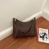 Bolso de mano tejido con patrón de color sólido 2026 transfronterizo para mujer, bolso cruzado simple y elegante, bolso de mano de moda para el trabajo