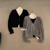 Top de punto Guangzhou Thirteen Lines imis*2026 mezcla de lana color de bloqueo otoñal/invernal estilo dos piezas falsas ajustado para mujer