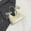 Bolso cubo minimalista de mano, nuevo modelo primavera 2026, alto atractivo estético, bolso de hombro moderno y elegante, bolso cruzado de moda nicho
