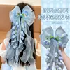 Novo Estilo de Primavera Laço Flor de Lírio do Vale Doce e Fofo Acessório de Cabelo para Meninas, Adequado para Uso Diário e Trajes Tradicionais, com Presilha de Cabelo com Fita Longa