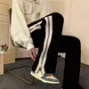 Calças Casuais de Verão 2026 com Caimento Solto Masculinas Primavera Outono High Street Calças Esportivas Largas Calças de Moletom para Meninos Marca Tendência Calças Longas