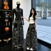 Jeans camuflados con estampado de estrellas negras para mujer, nuevo estilo de otoño, con diseño de parche en el bolsillo, pantalones casuales de pierna recta ancha